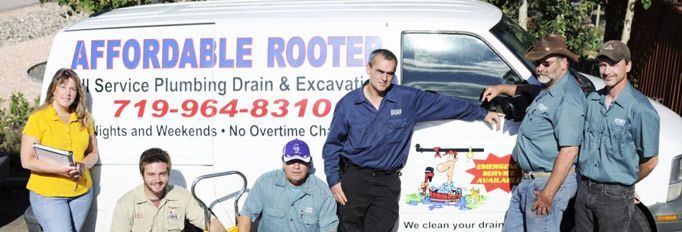 The Affordable Rooter team with their service van